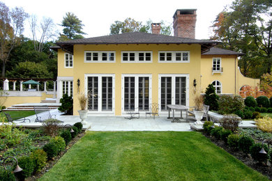 Example of a tuscan exterior home design in New York