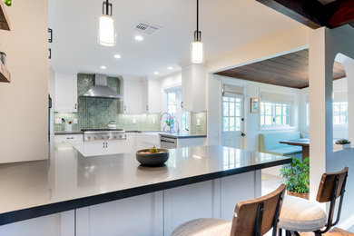 Inspiration for a mid-sized transitional kitchen in Los Angeles with shaker cabinets, white cabinets, quartz benchtops, green splashback, ceramic splashback and grey benchtop.