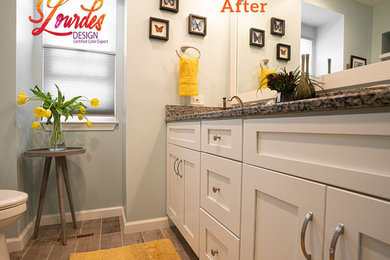 Example of a mid-sized transitional master blue tile and ceramic tile ceramic tile and multicolored floor alcove shower design in DC Metro with shaker cabinets, white cabinets, a one-piece toilet, blue walls, a drop-in sink, granite countertops and a hinged shower door