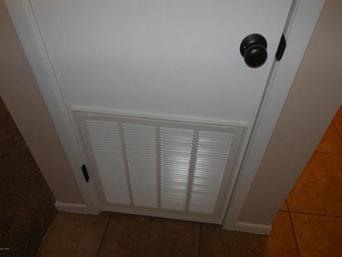 Gas Furnace and Electric Water Heater in Closet