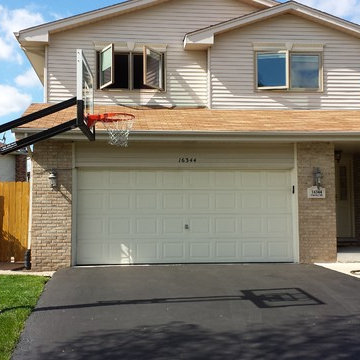 Tom Z's Pro Dunk Silver Basketball System on a 35x18 in Orland Hills, IL
