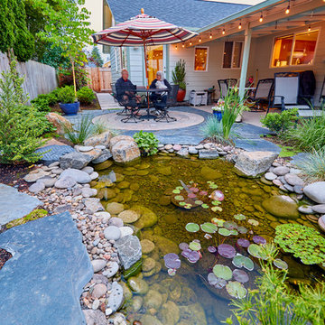 Enchanting Backyard with Fountain and Pond