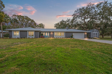 Example of a beach style exterior home design in Tampa