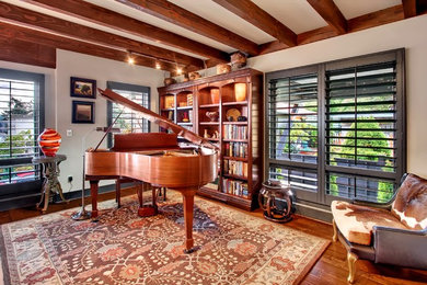 Large arts and crafts open concept medium tone wood floor and brown floor living room photo in Seattle with a music area, beige walls and no fireplace