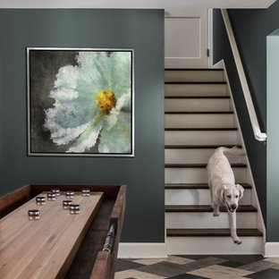 Photo of a medium sized classic basement in Portland with blue walls, vinyl flooring and multi-coloured floors.
