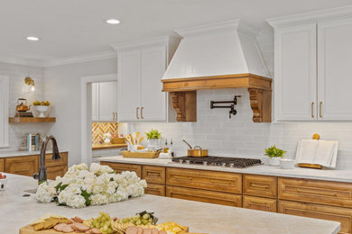 Example of a french country kitchen design in Dallas