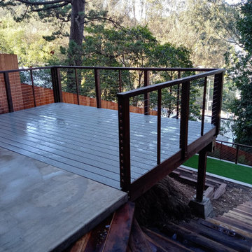 A Steeply Sloped Backyard is Transformed Into a Multi-Level Entertainment Venue