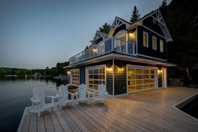 Example of a blue two-story exterior home design in Toronto