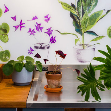 Plant Life in White Glass Splashback