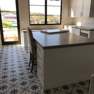 Photo of a medium sized modern craft room in Sacramento with white walls, tatami flooring, no fireplace, a freestanding desk and multi-coloured floors.