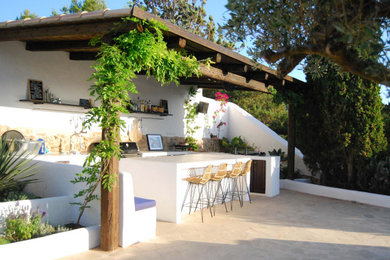 Photo of a large mediterranean patio in Other.