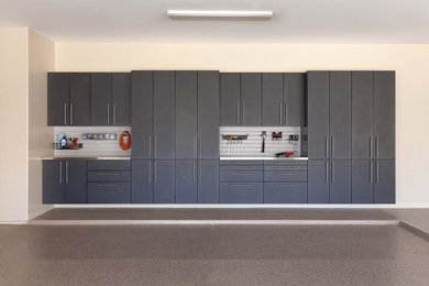 Garage workshop - mid-sized contemporary attached garage workshop idea in Philadelphia