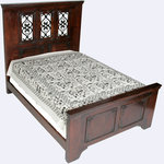 Moti - Eastern King Bed - Old World designs meets modern day functionality in this timeless collection. Made to feel right at home in a wide range of homes, these pieces are are beautifully hand carved in all the right places and will be cherished for generations.      Crafted of Kiln-dried solid Acacia Wood with a hand finished warm deep stain.