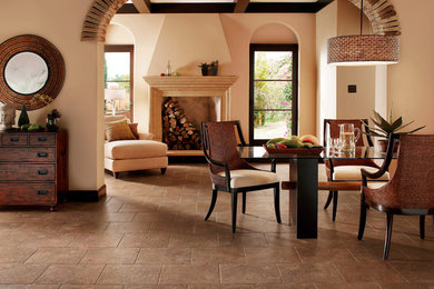 Example of an eclectic dining room design in Dallas