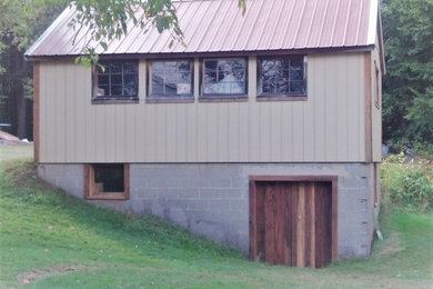 Inspiration for a rustic shed remodel in Other