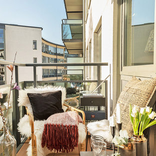 Ejemplo de balcones escandinavo, de tamaño medio, sin cubierta