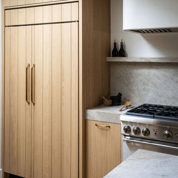 Venetian Plaster Range Hood and Stone Backsplash | Organic Modern Kitchen