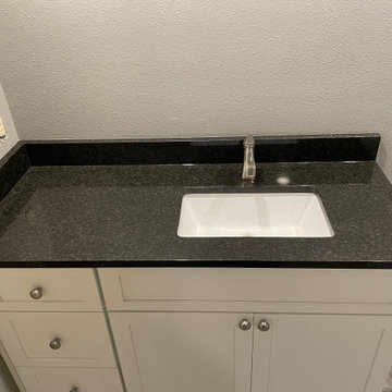 BATHROOM - New Tub, 12x24 Brown Tile, Gray Plank Floor Tile, Tebas Black Granite