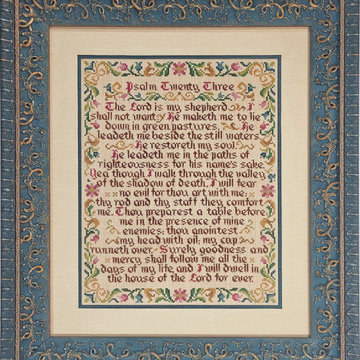 Heirloom needlework reframed in an updated look protecting it from future damage