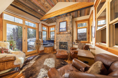 Example of a mountain style family room design in Denver