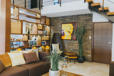 Living room - tropical living room idea in Other