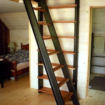 Cherry and steel stairs and bookcase