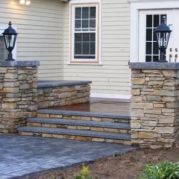 Deck and stone wall.