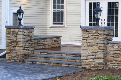 Deck and stone wall.