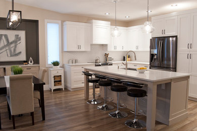 Example of a transitional kitchen design in Vancouver