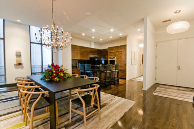 Mid-sized trendy medium tone wood floor kitchen/dining room combo photo in Minneapolis with white walls and no fireplace