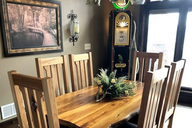 Example of a mountain style dining room design in Other