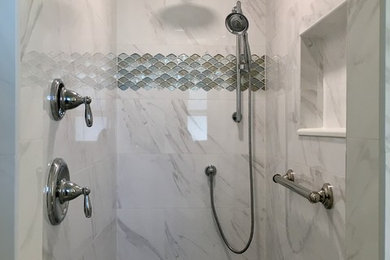 Inspiration for a mid-sized transitional master white tile and porcelain tile gray floor doorless shower remodel in New Orleans with green walls and granite countertops
