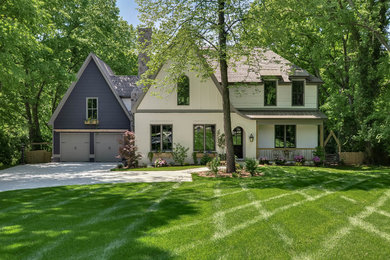 Example of a transitional white two-story exterior home design in Nashville