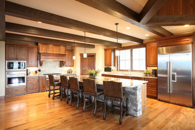 Example of a mountain style kitchen design in Denver