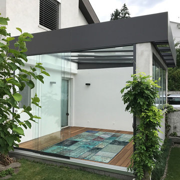 Lichtdurchfluteter Sommergarten aus Glas & Aluminium