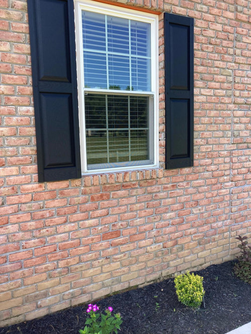 Colors to go with pink brick and warm stone