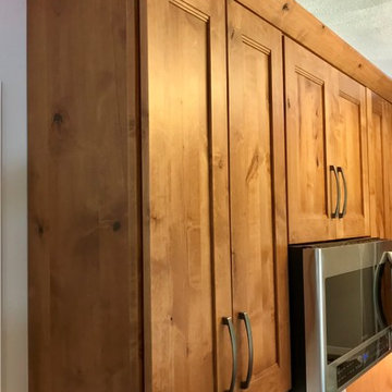 Dura Supreme Cabinets Knotty Alder Butternut Romanix Granite Galley Kitchen