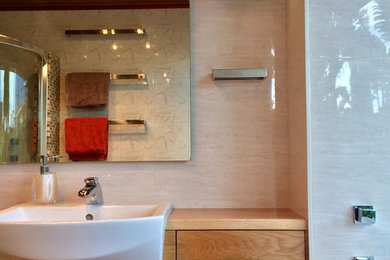 This is an example of a midcentury bathroom in Other.