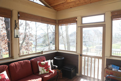 Example of a sunroom design in Other