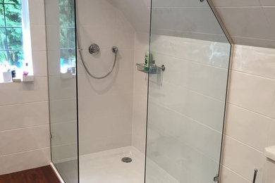 Bespoke shower enclosure to accomodate Sceiling