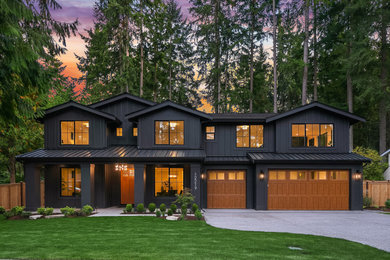 Example of a farmhouse exterior home design in Seattle