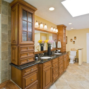 Wood Highlights Warm This Master Bathroom Remodel in Potomac Falls