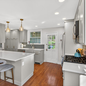 Contemporary Kitchen & Dining Space with Timeless Wood Details
