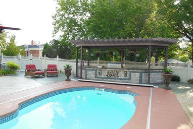Example of a mid-sized island style exterior home design in Milwaukee