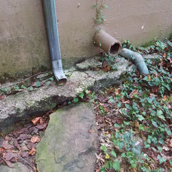 Downspout damaging footer - Products