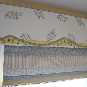 Cornice board with patchwork roman shade