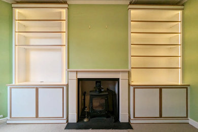 Bespoke alcove units with oak details and LED lights