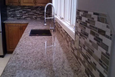 Tiled Backsplash and Granite Countertop