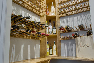 Example of a trendy wine cellar design in Denver