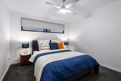 Contemporary bedroom in Brisbane.